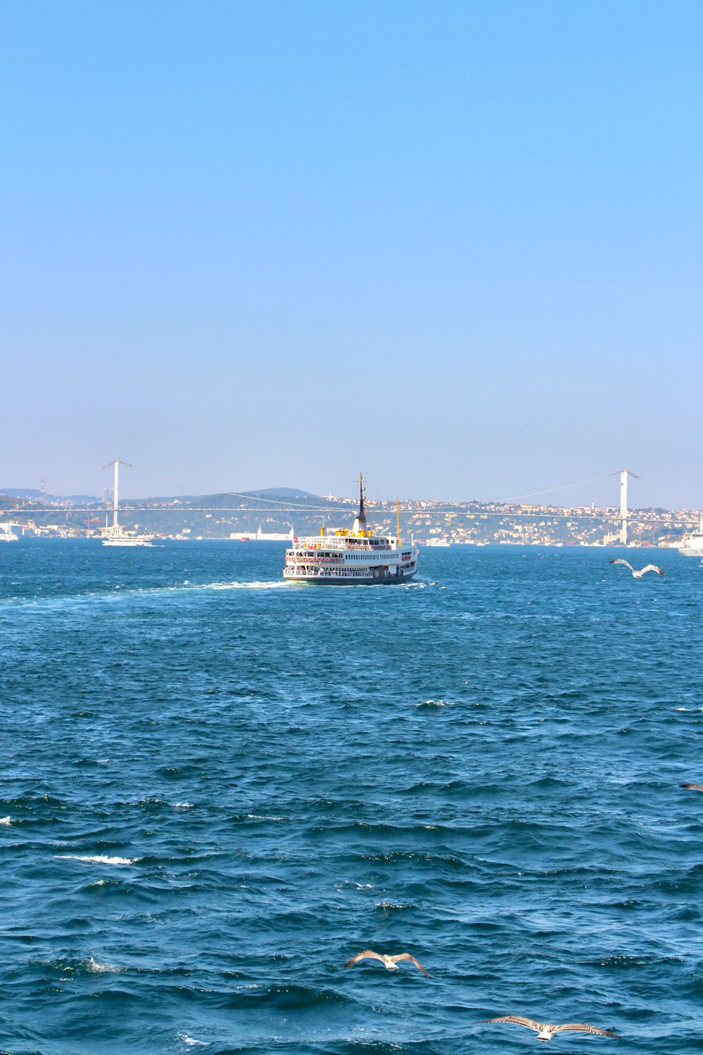 a large boat traveling across a large body of water