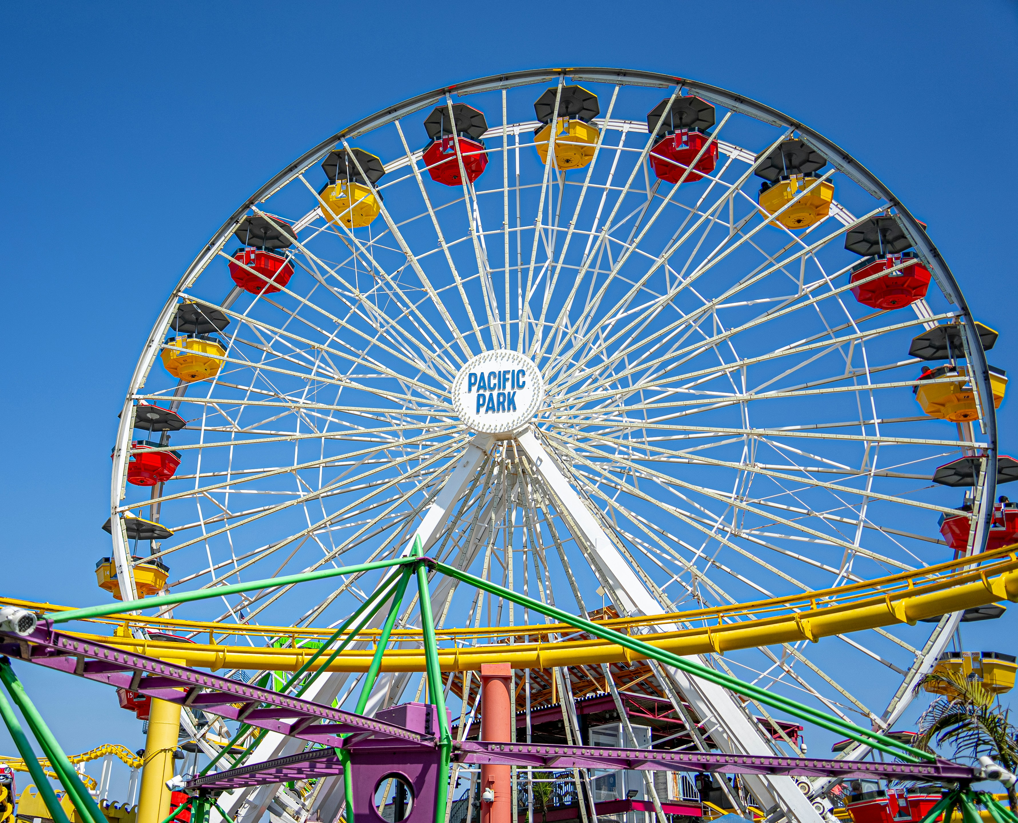 a ferris wheel with a blue sky in the background