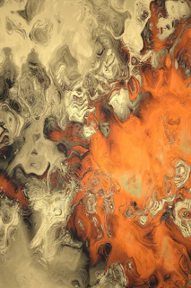 A textured beige and brown background with splashes of orange, reflecting the brand’s lively spirit