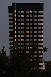 Exterior view of staynest extended stay building at dusk