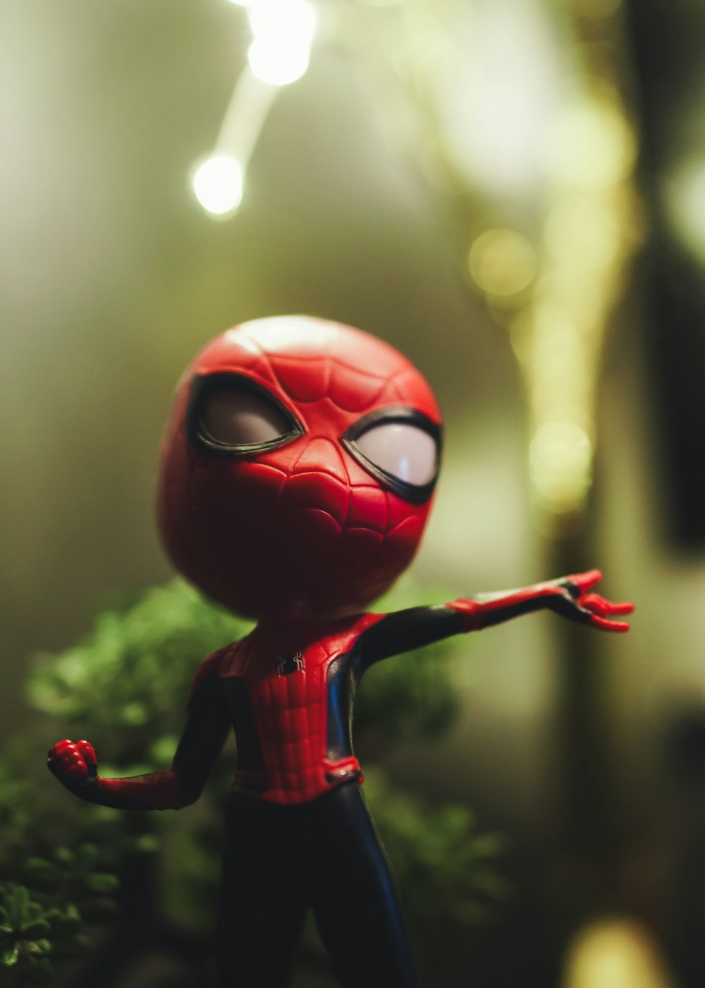 a close up of a toy spider man