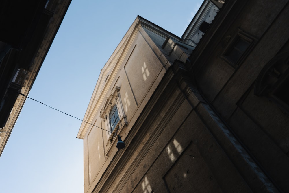 a tall building with a clock on the side of it