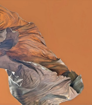 Close-up of a rugged earth-toned custom printed t-shirt with a bold design.