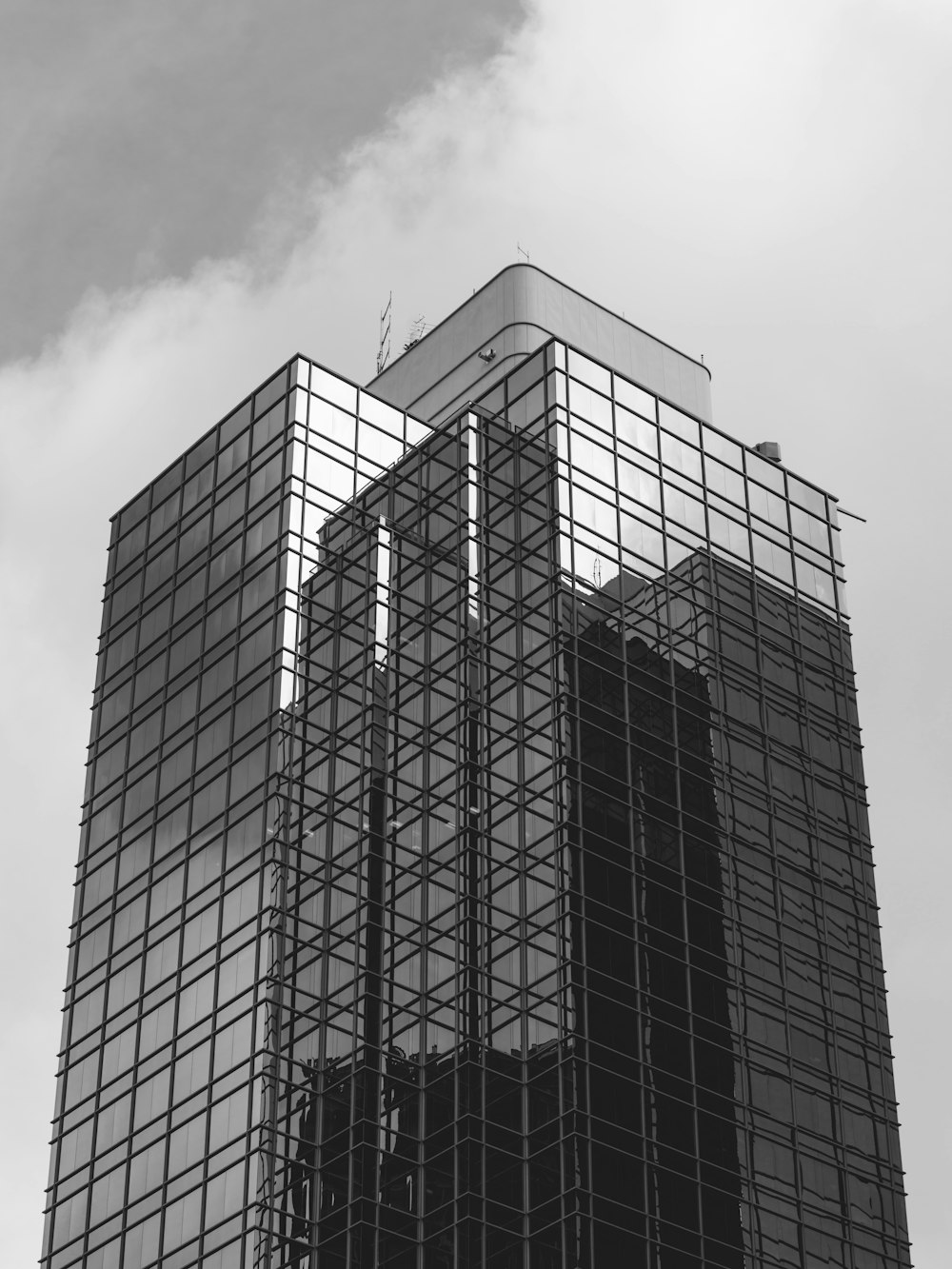 a black and white photo of a tall building