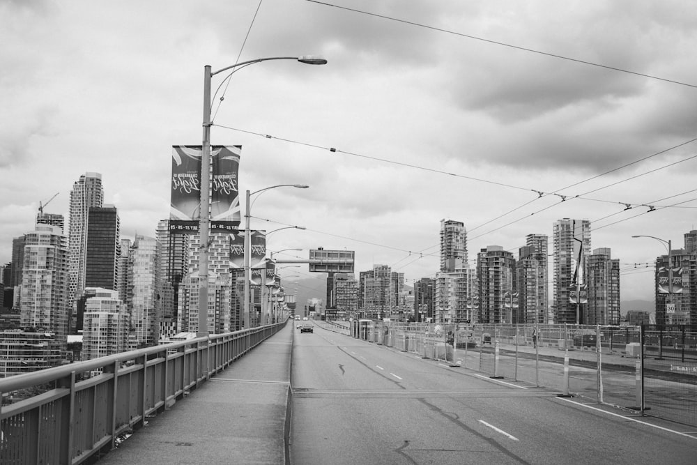 a black and white photo of a city street