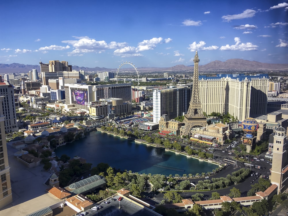 a view of a city with a lake in the middle of it