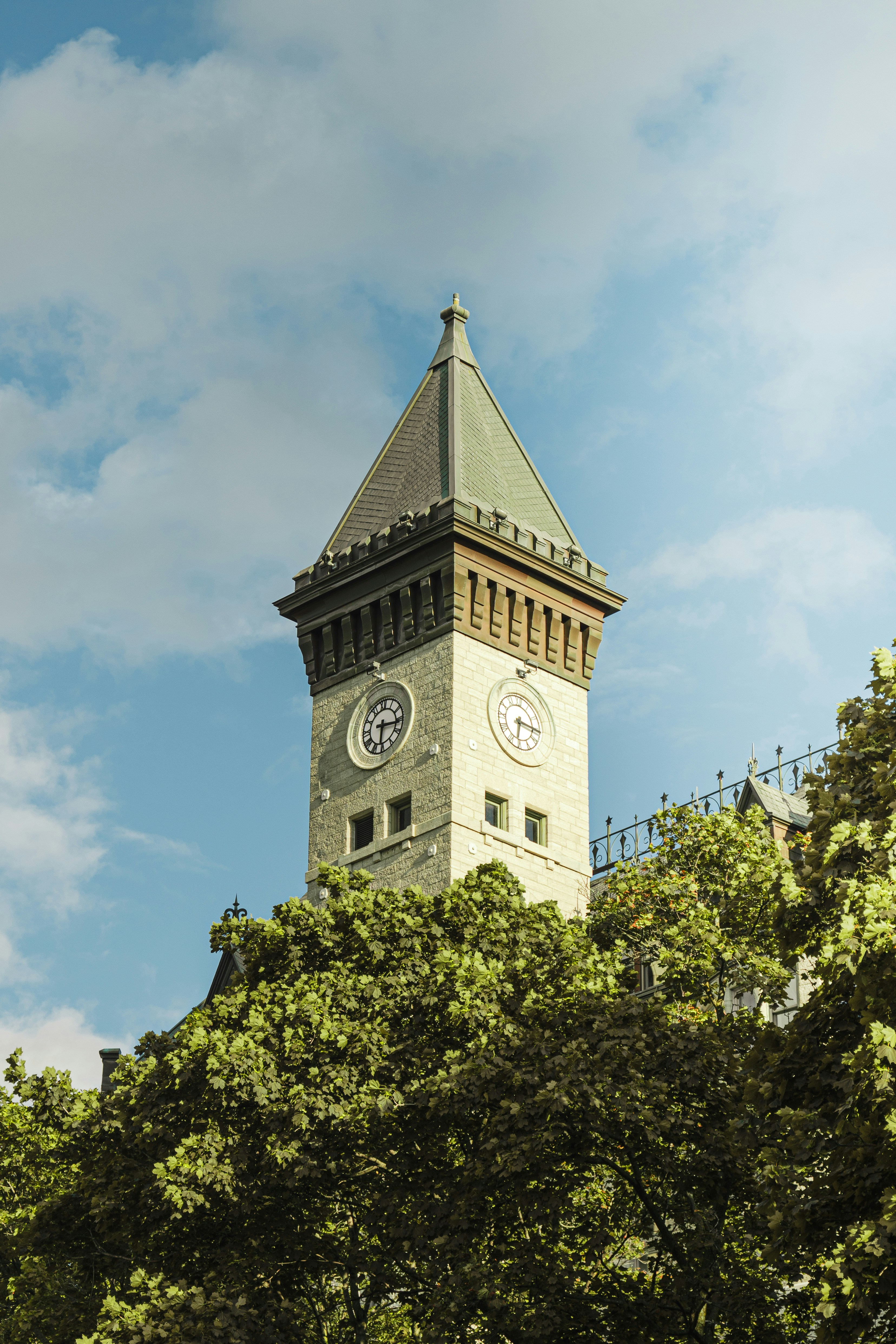a tall clock tower with a sky background