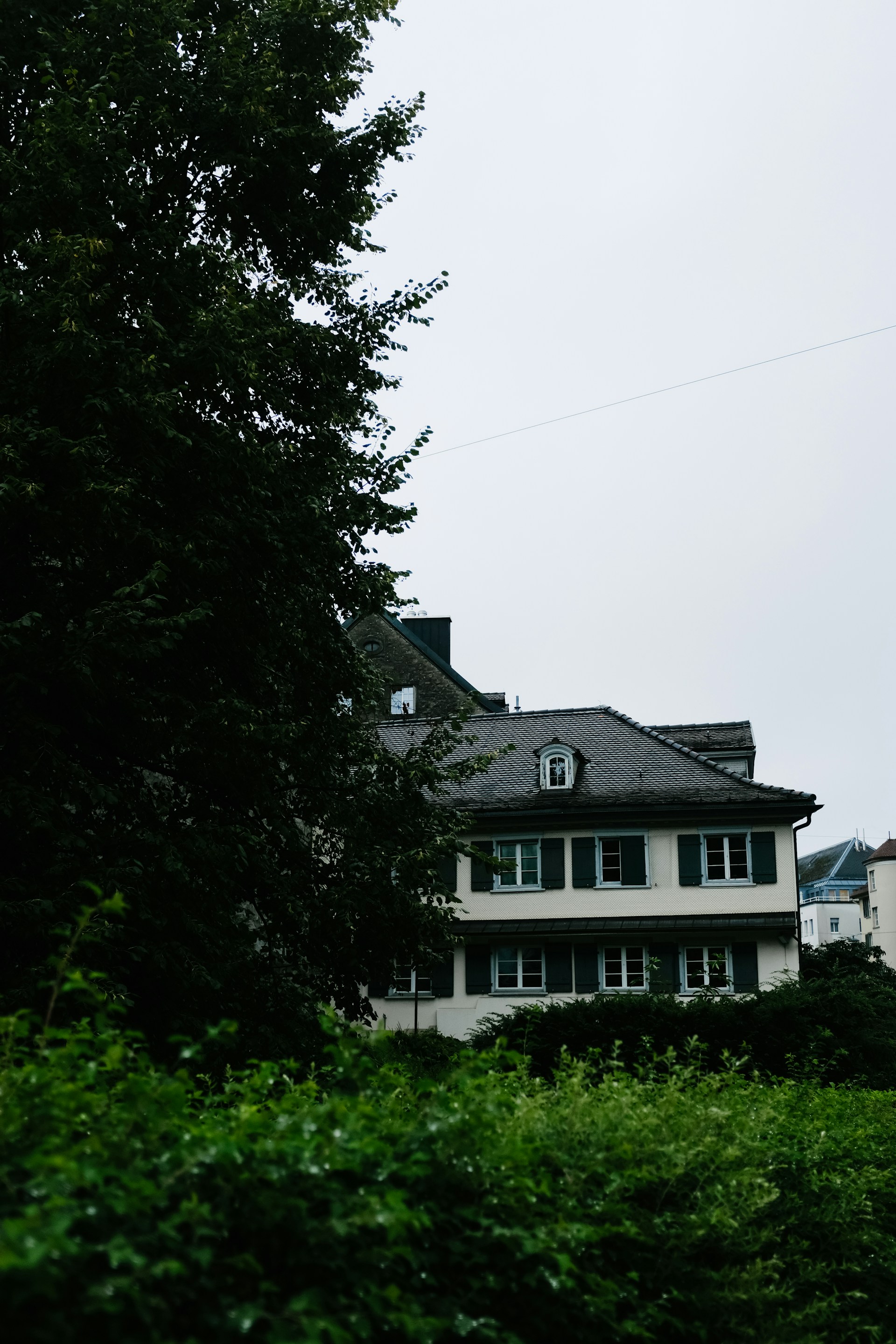 woman wearing yellow long-sleeved dress under white clouds and blue sky during daytime