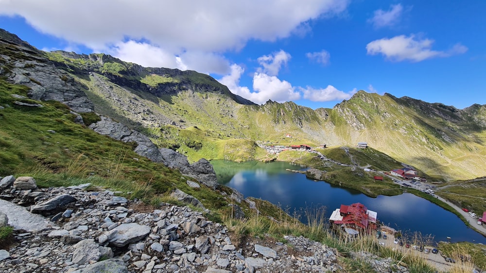 a small lake in the middle of a mountain range