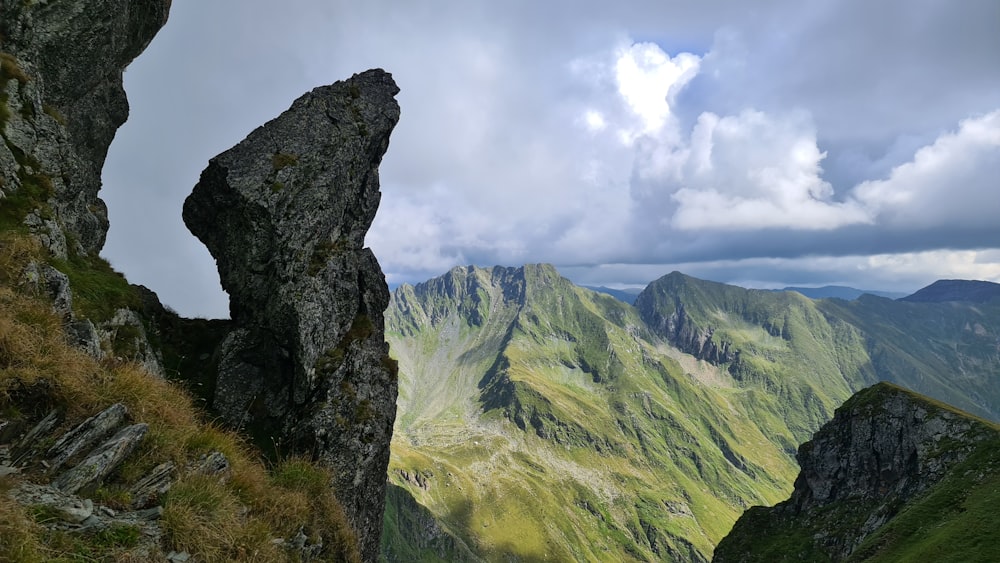 a view of a mountain range from the top of a mountain