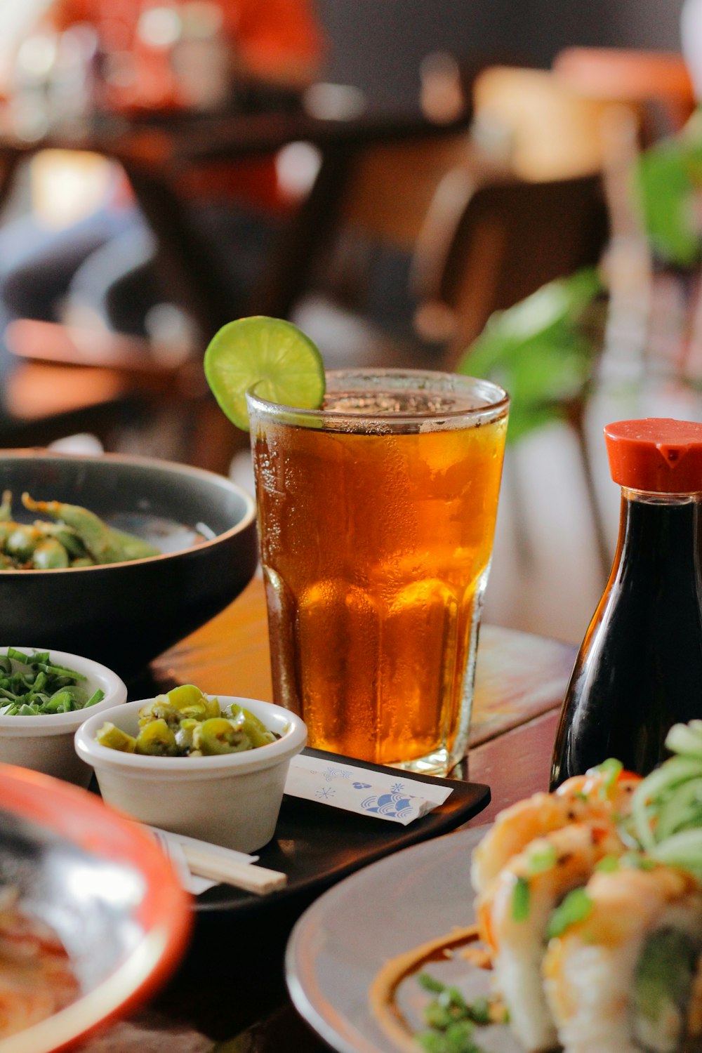 a table topped with plates of food and drinks