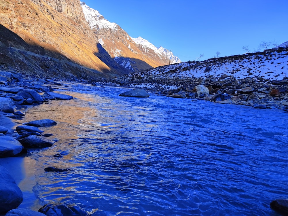 a river running through a rocky mountain valley