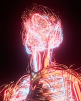 A vibrant and intricate visualization of a human form composed of neon-like light strands. The colors predominantly consist of reds, blues, and warm hues, creating an electrifying and dynamic effect. The structure resembles the nervous system, with a focus on the head and upper torso.