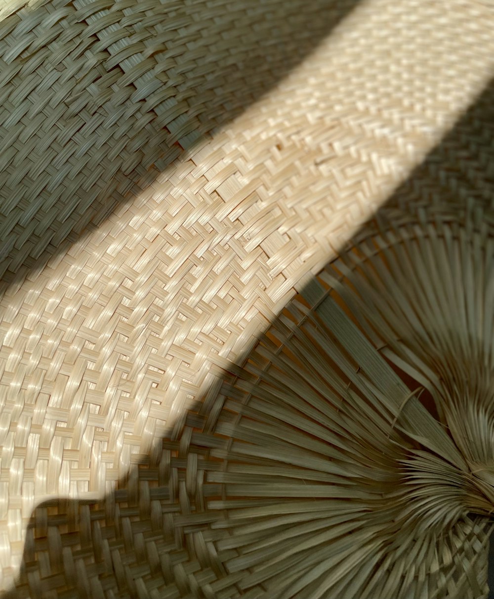 a close up view of a straw umbrella