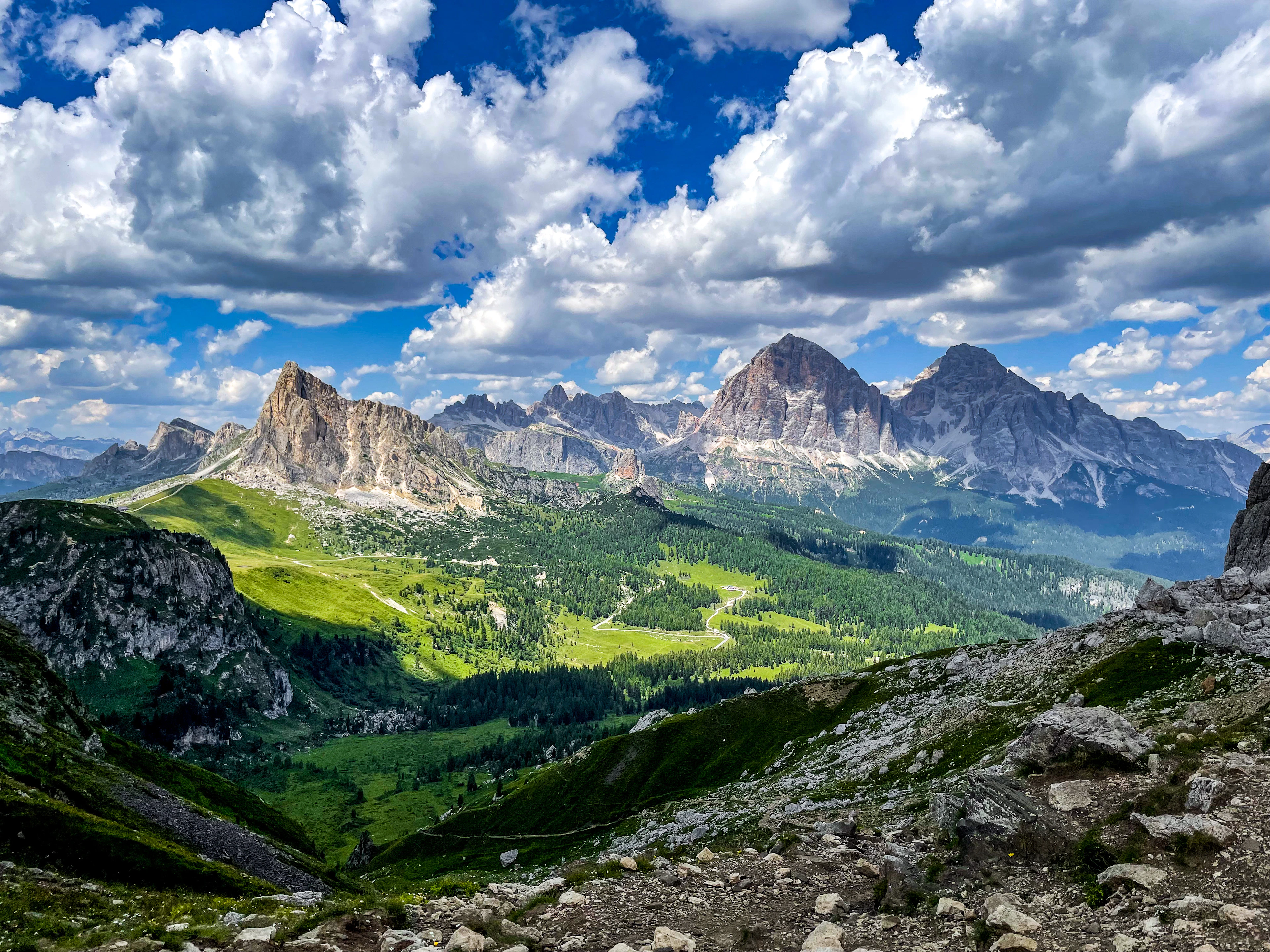 Mountains and valleys of the Dolomites under a cloudy sky