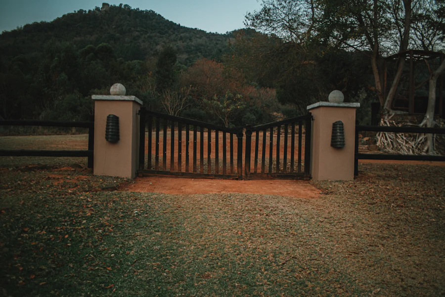 Technician servicing an automatic gate at a Bay Area property