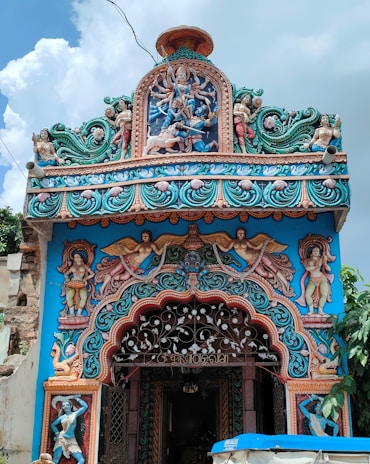 Entrance of Yatri Nivas featuring traditional architecture and vibrant colors.