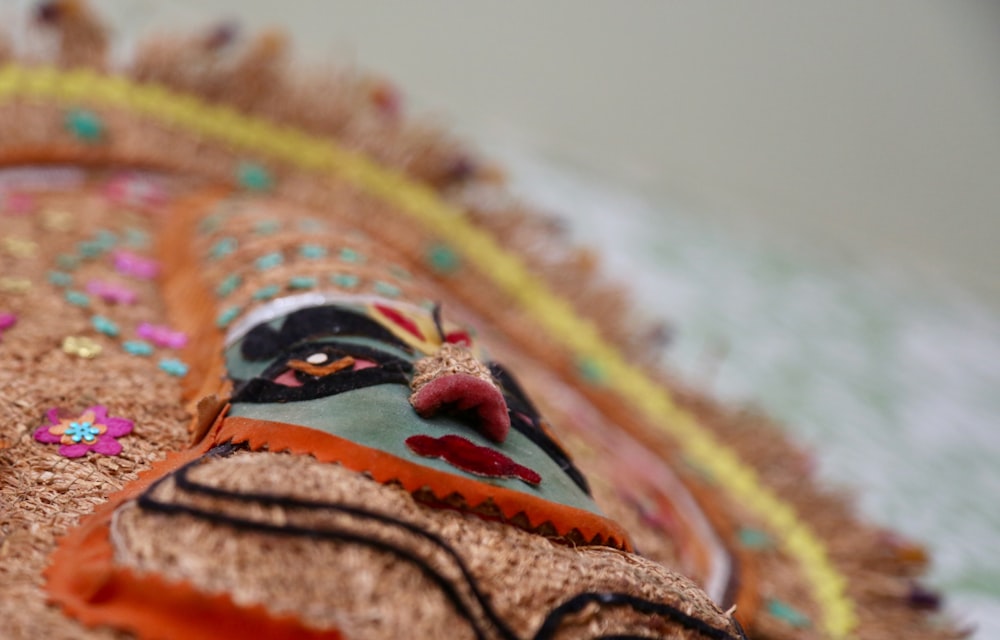 a close up of a decorative item on a table