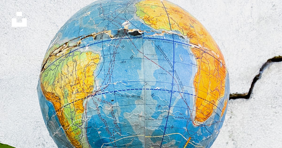 A Blue And Yellow Globe Sitting On Top Of A Radio Photo Free Old a-blue-and-yellow-globe-sitting-on-top-of-a-radio-photo-free-old