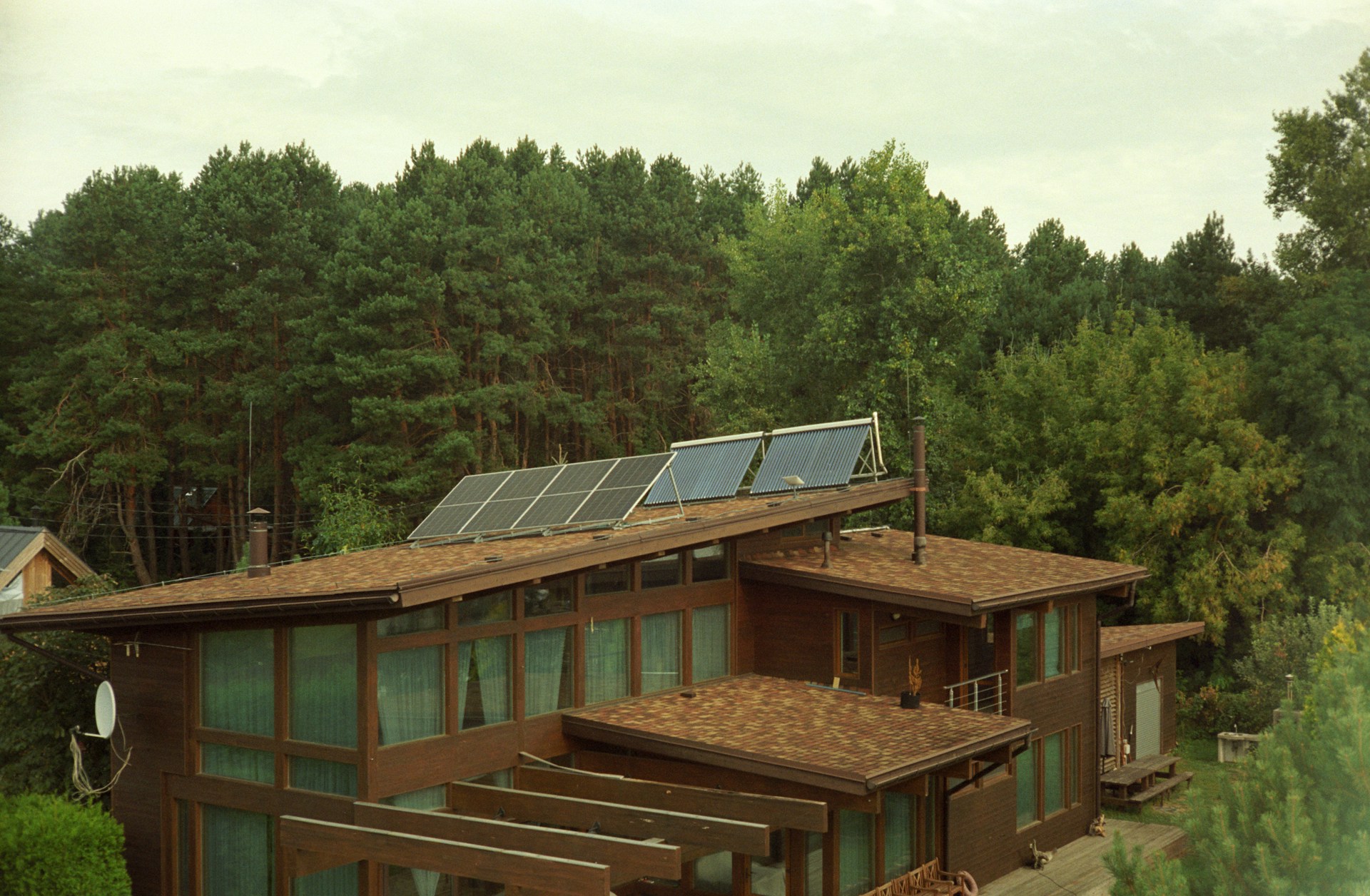 a house with a solar panel on the roof