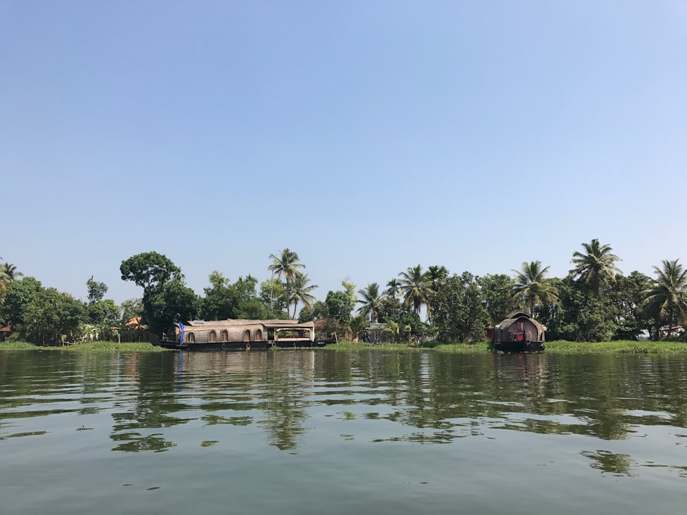 a body of water with a house on it