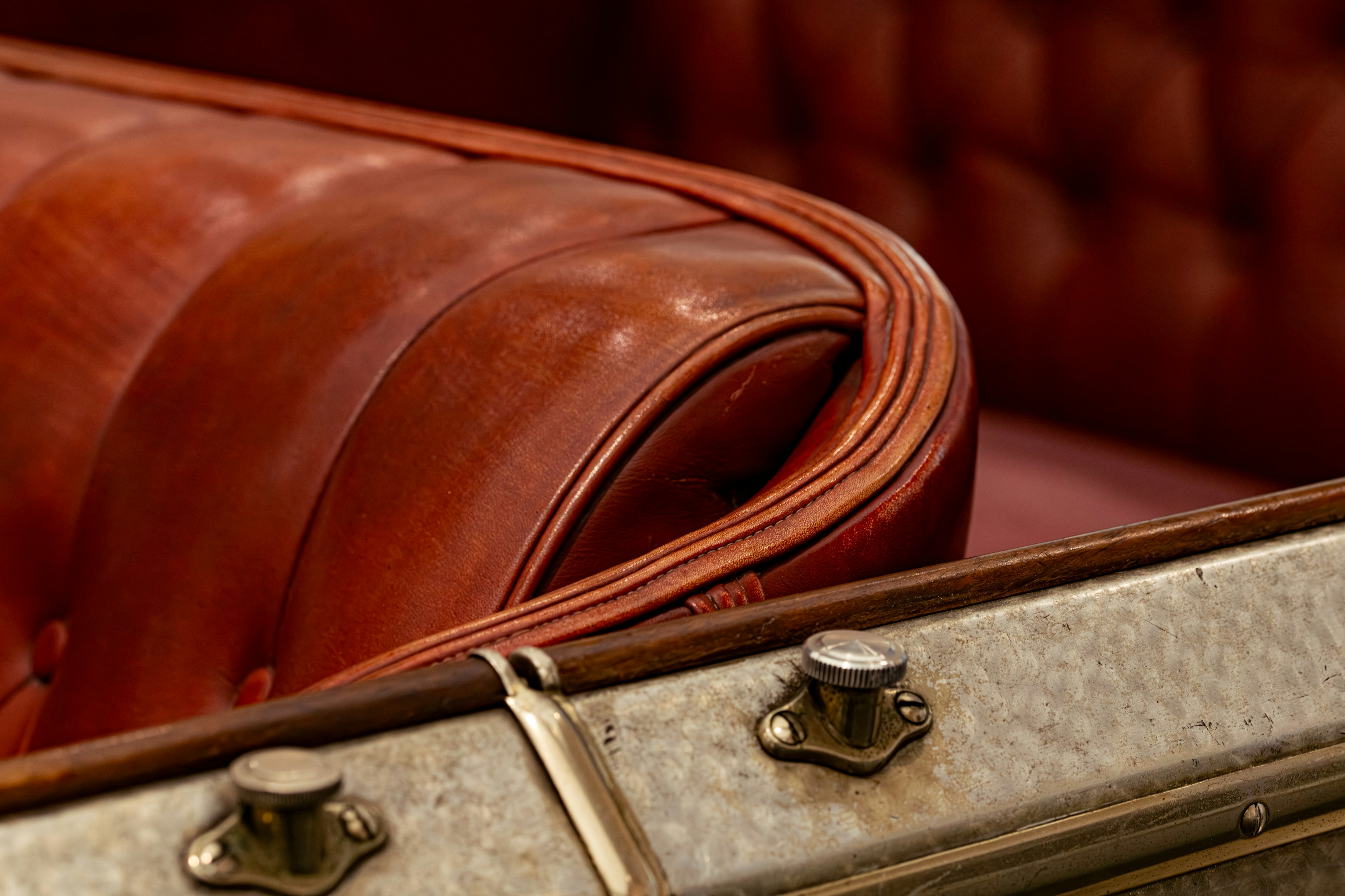 Close up of a suitcase with leather seat