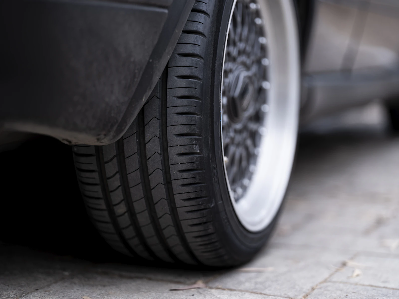 Close-up of a car wheel and tire