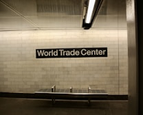 a subway station with a sign that says world trade center