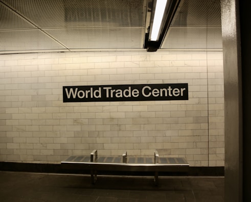 a subway station with a sign that says world trade center