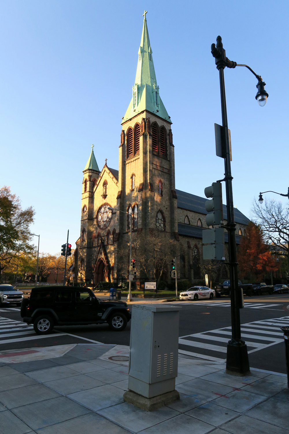 a large church with a steeple and a clock tower
