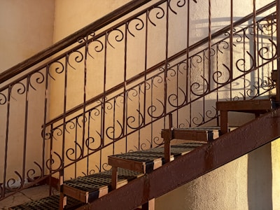 A beautiful staircase with steel railings.