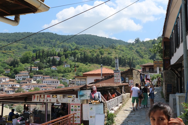Tourists exploring a charming village in Portugal.