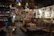 Cozy interior of Le Postillon with warm lighting and rustic alpine decor.
