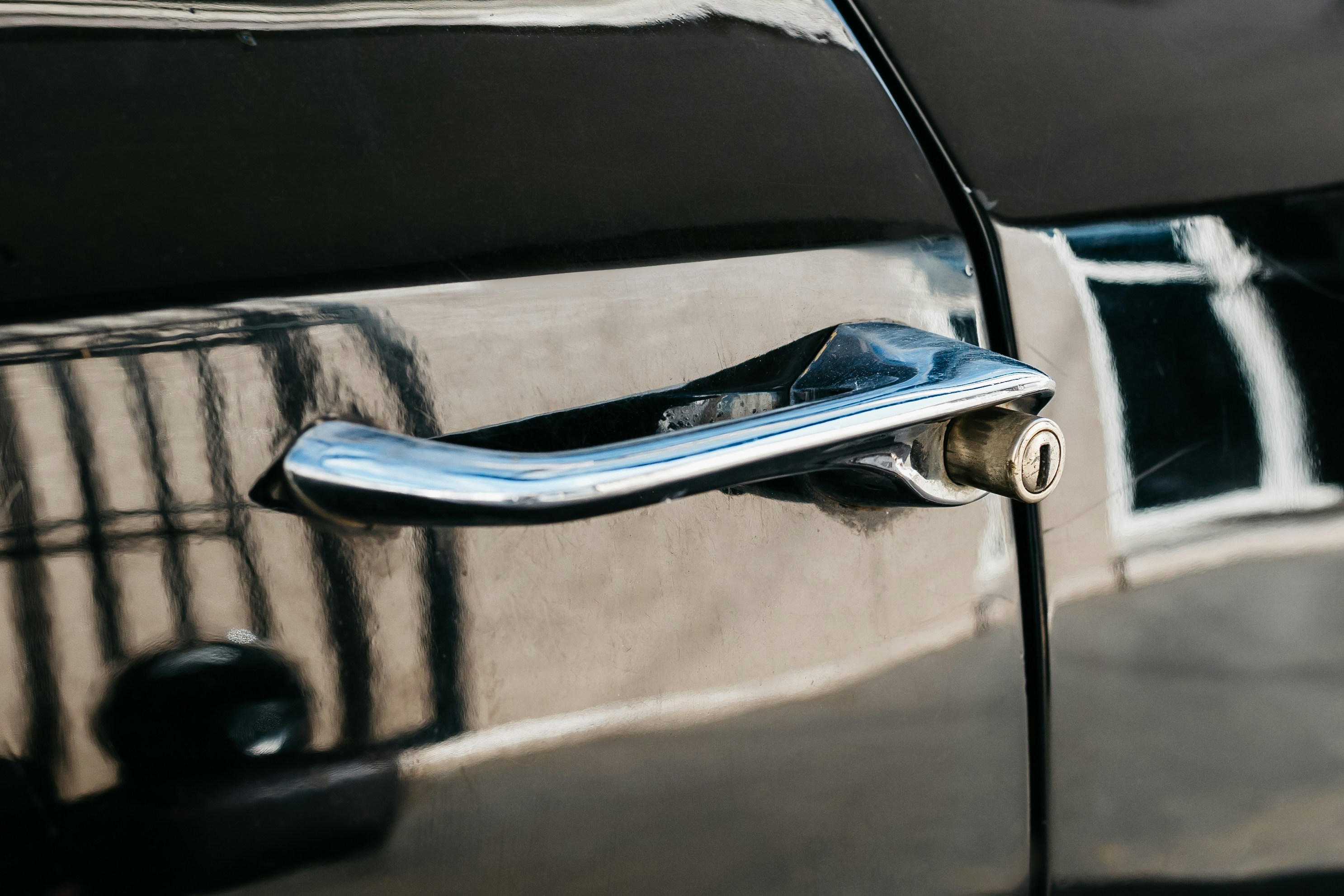a close up of a door handle on a car