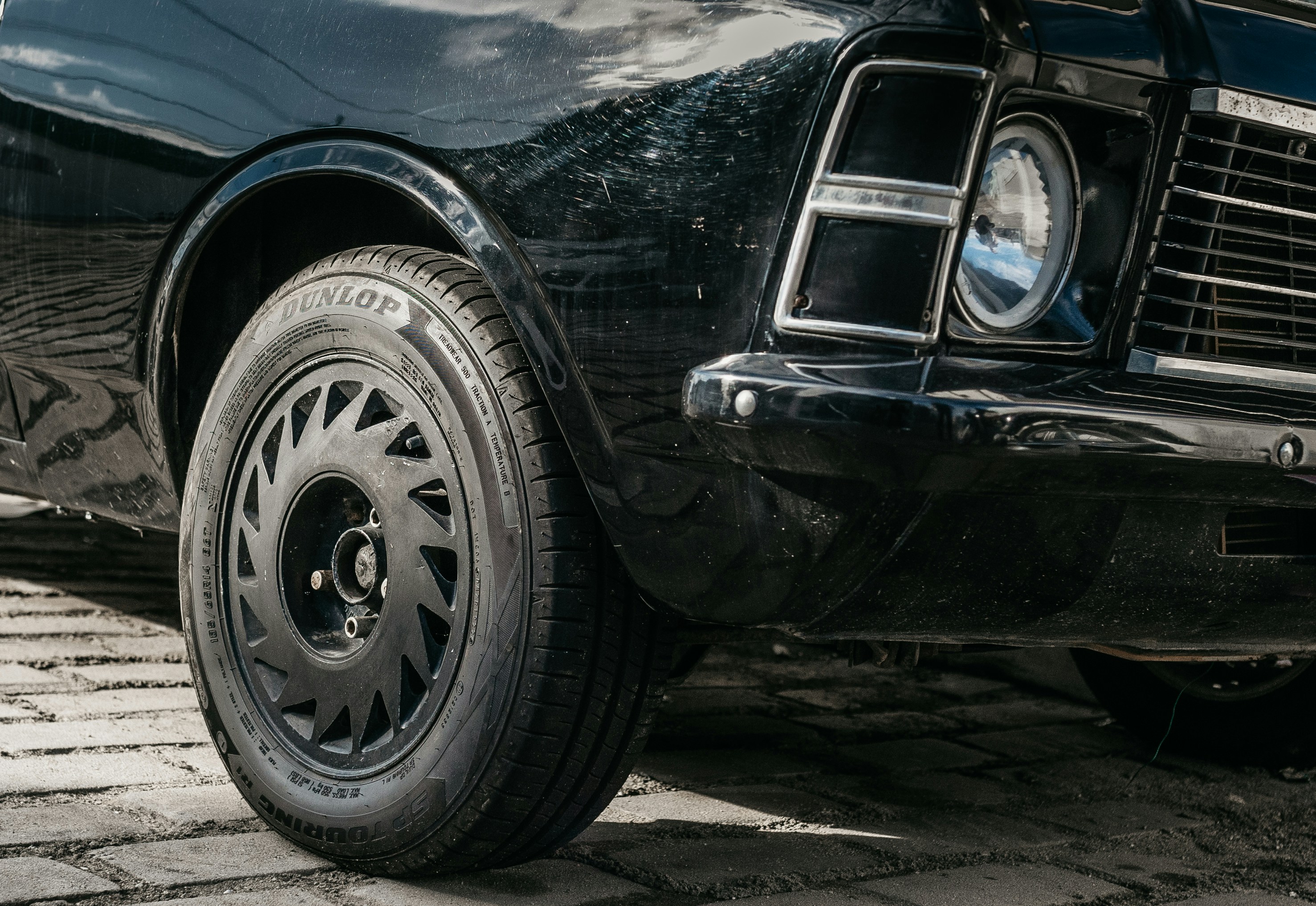 a close up of the front of a black car