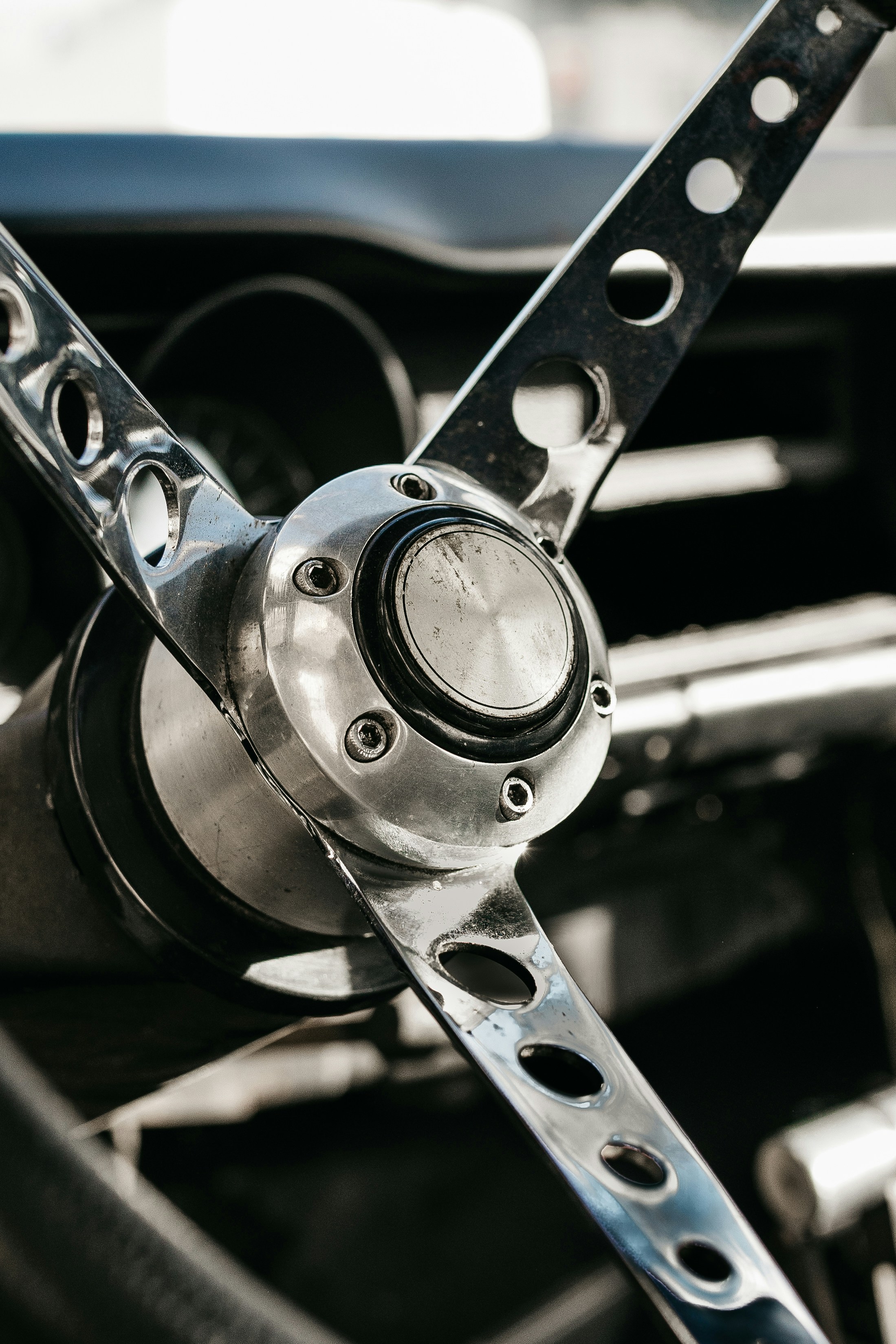 a close up of a steering wheel on a car