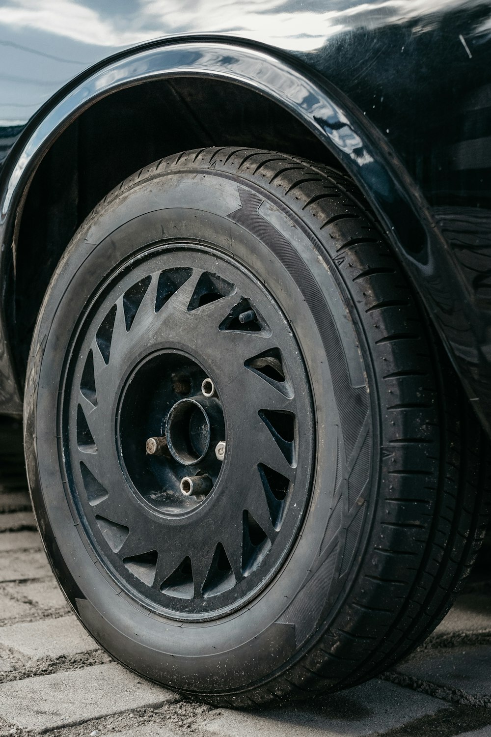 a close up of a tire on a car