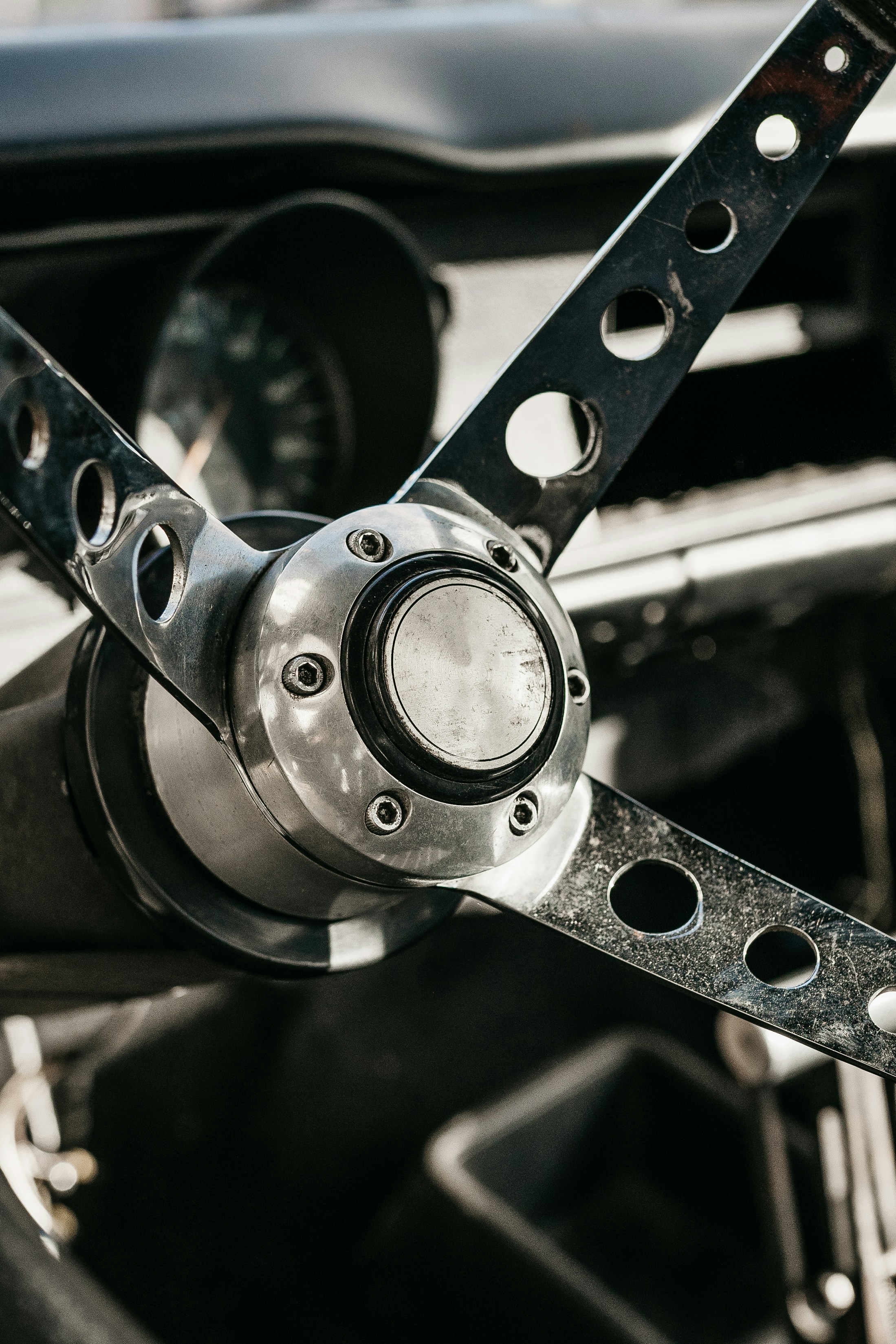 a close up of a steering wheel on a car