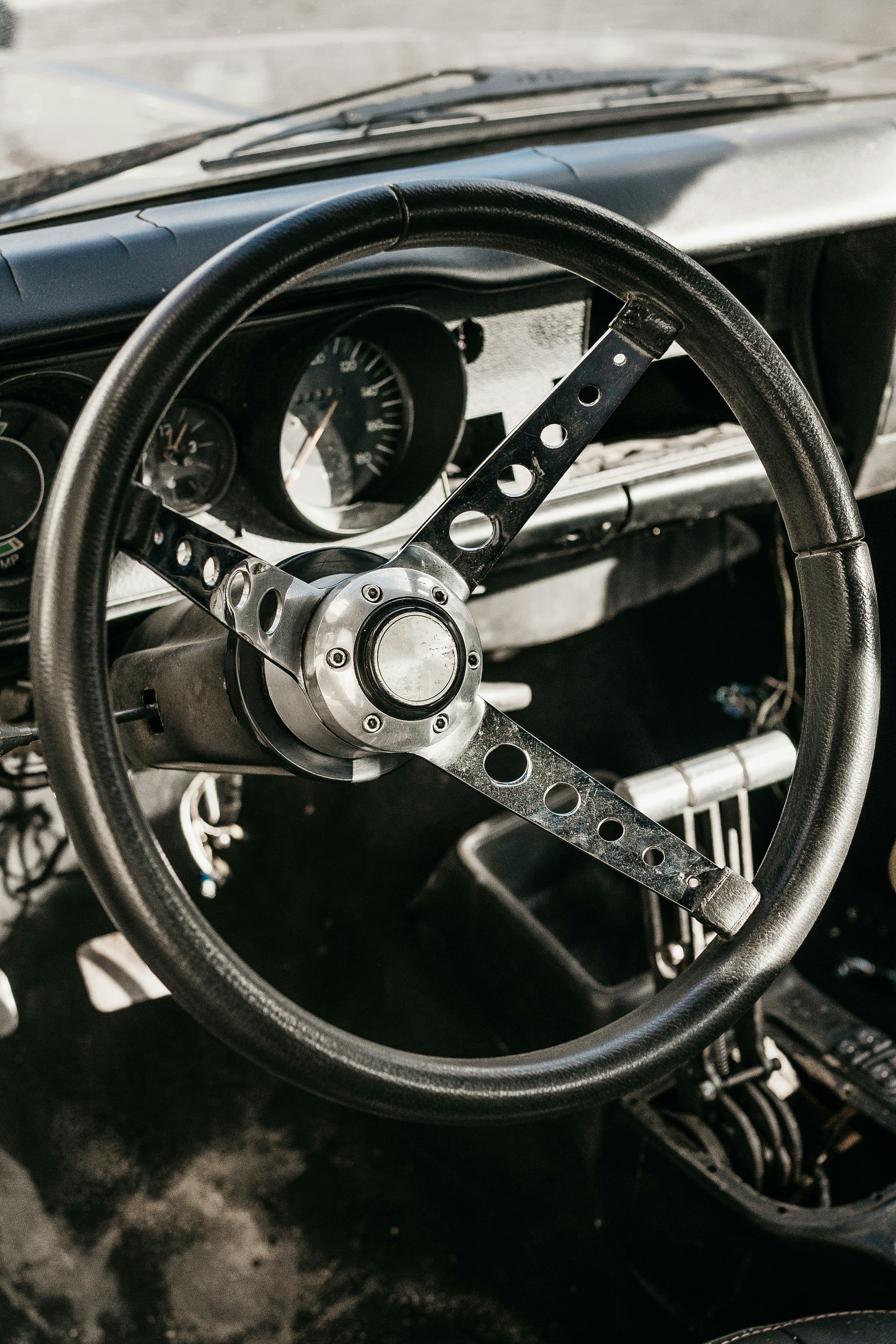 a steering wheel and dashboard of a car