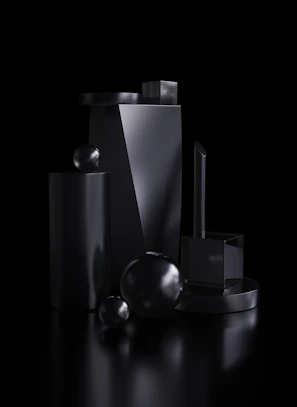A collection of varied volumetric artworks arranged artistically on a sleek black backdrop.