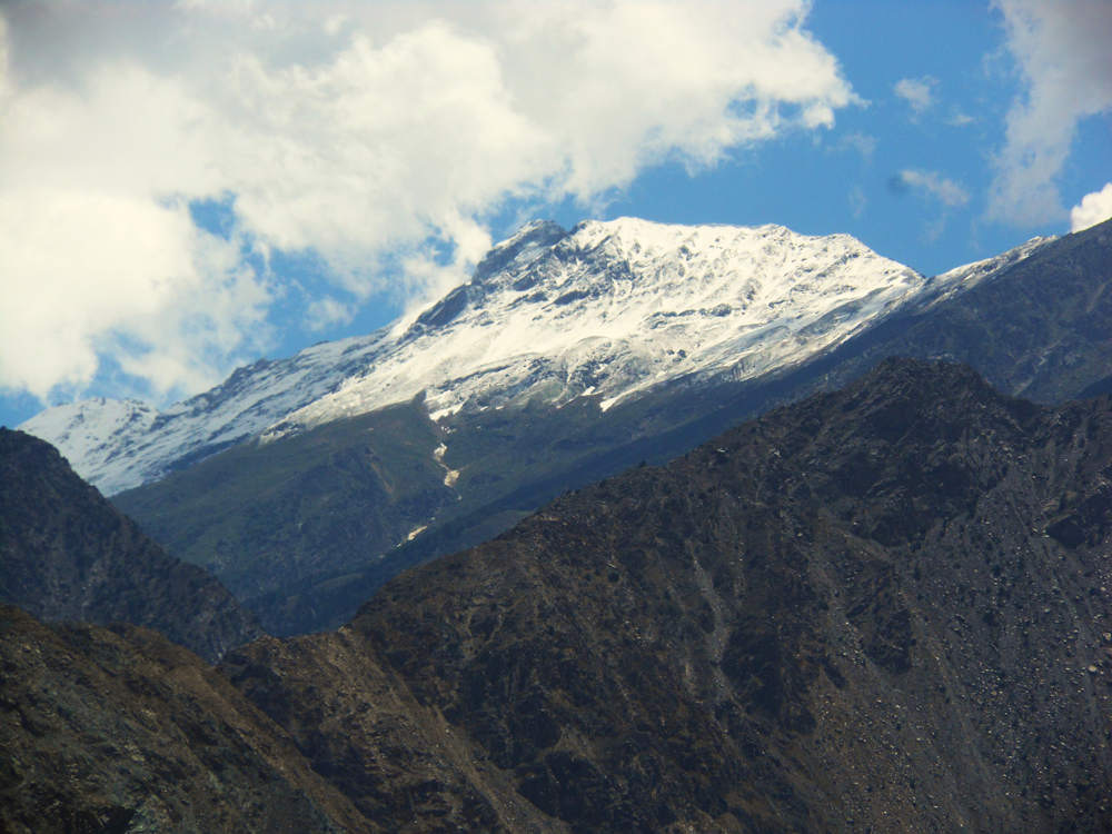 a mountain with snow on top of it