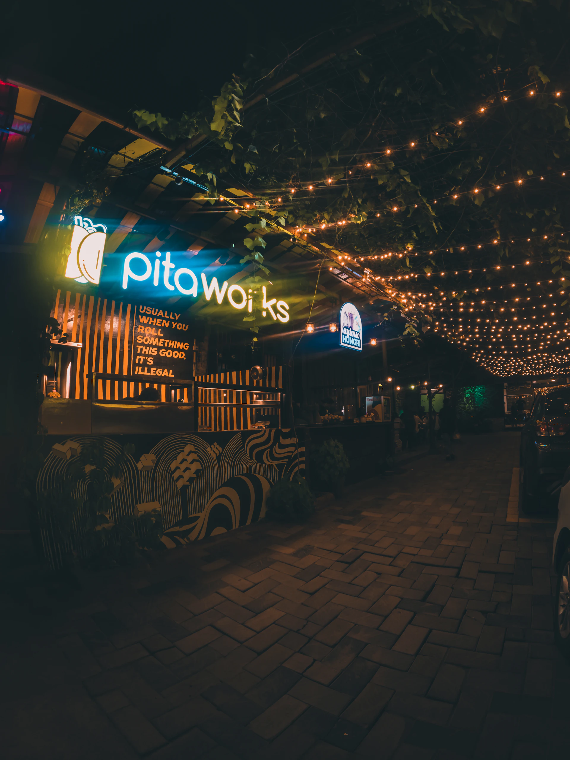 woman wearing yellow long-sleeved dress under white clouds and blue sky during daytime