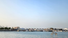 A marina with boats docked, highlighting a seamless payment experience.