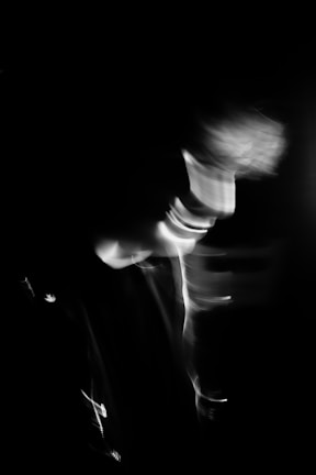 An artistic AI-generated image blending abstract shapes in monochrome tones.