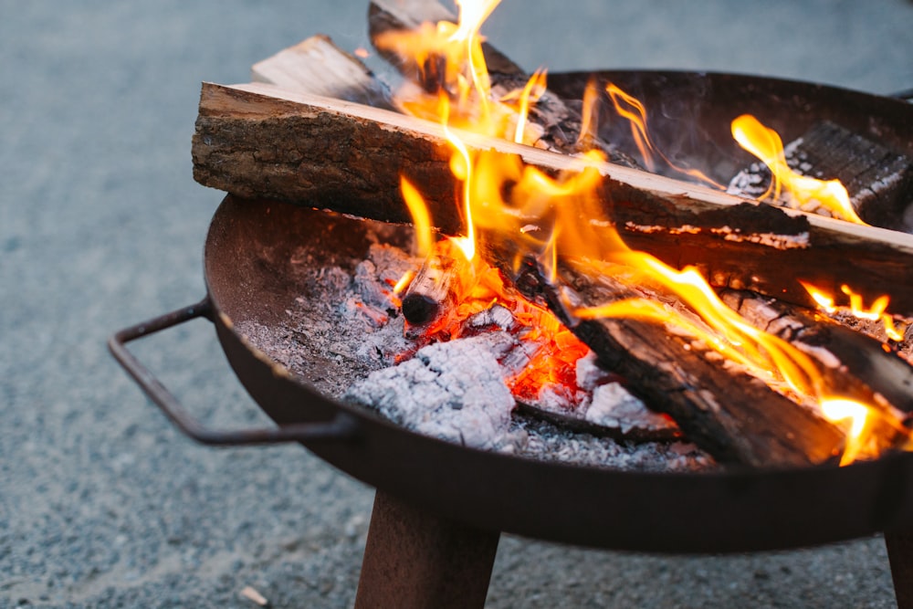 a close up of a fire in a grill