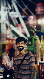 A guest smiling brightly while rotating on the uniquely 360 photobooth platform.