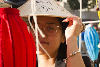 A warm portrait of the founder Santy filming a local cultural event in Hualien.