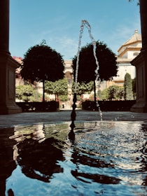A peaceful moment of reflection by a small water fountain in the school courtyard.