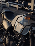 A Royal Enfield motorcycle undergoing custom modifications with attention to detail.