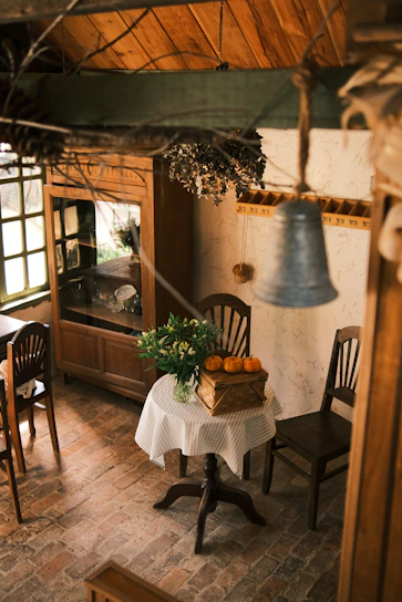 Cozy kitchen scene with rustic wooden table and fresh ingredients ready for cooking.